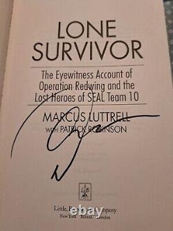 MARCUS LUTTRELL SIGNED BOOK THE LONE SURVIVOR Seal Team 10 HCDJ PSA DNA COA NAVY